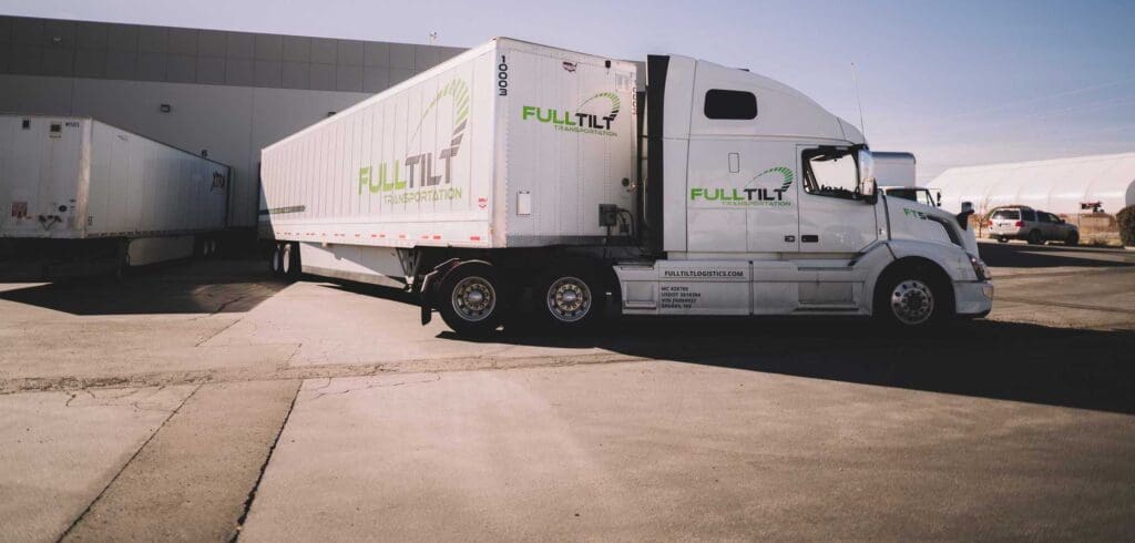 A Full Tilt-branded tractor is outside of a Reno, Nevada warehouse